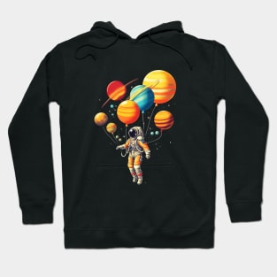 Astronaut Floating with Planets as Balloons Colourfu Hoodie